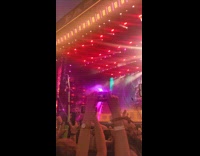 Man on wheelchair crowd surfing