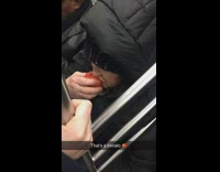 Woman eats a whole tomato on subway train