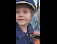 Little girl in police officer outfit says her backup is coming