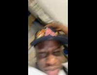 Guy throws white fan at friends head