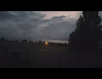 Lighting and Thunder behind the thick clouds in the horizon