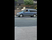 Driver plays maracas in van 