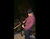 Champagne bottle explodes on guy 