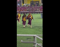 Girl brings dog to graduation ceremony