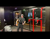 Guy blue lifting gloves  dances at the gym 