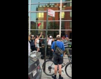 Roaming DJ mixing with crowd behind him