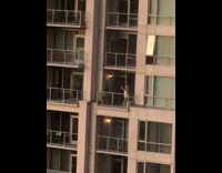 Girl yellow dress selfie balcony building