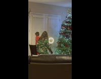 Kid dances in front of the phone with a ring light in the tripod