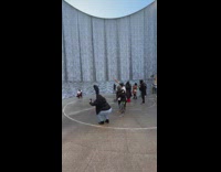 Guy films a music video at waterwall park 