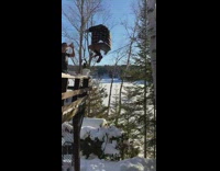 Guy chugs beer jumps off railing snow