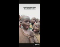Man Pans Camera to Children with Filter