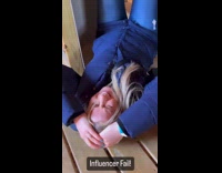 Collab IITW - Woman waves on the camera and hit her head on the slide