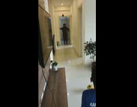 Kid kicks ball at mom with helmet