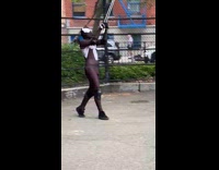Guy in Marvel Character Costume Swings at Playground 