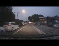 Guy falls off bike in dashboard cam era 