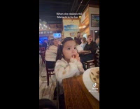 Kid becomes giddy when mariachi band plays 