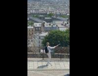 Bald guy dances selfie stick white pants 