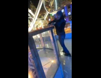 Man struggles to balance himself ice skating 