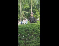 man purple hair jacket spin 