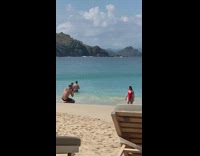 Woman red one piece beach photoshoot