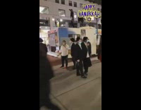 Guys stand and dance on white rv 