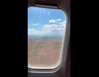 Another airplane fly beside airplane of filmer