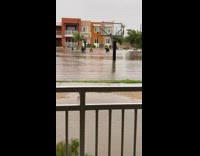 Collab BitchMP - Group playing basketball flooded court 
