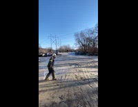 Construction worker frozen water toss