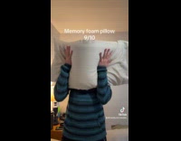 Couple do scream test on pillows 