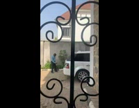 Man Dances as Lady Sings for Him