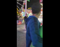 Sheriff police officers take pictures at fair