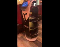 Robot server carries two glasses in restaurant