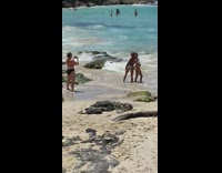 Two women bikini back to back pose beach Part 2