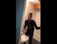 Guy brushing his teeth slams the door open and close drops mirror 