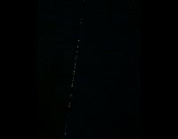 Woman walks to her cottage and something on the sky