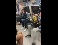 Collab Subway Creatures - Guy in Darth Vader helmet mask and Pikachu on barbecue grill sings and dances to music on subway train 