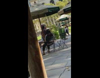 Person hat made from colorful plastic bags 