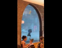 Woman running to take refuge from the storm