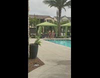 Man and woman bikini outfit tiktok dance poolside