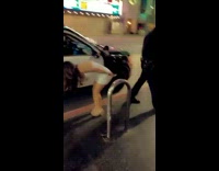 Girl white dress bends over for Police officer