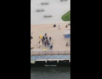 Large group people dance wood pier 