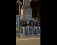 Collab IITW - Two people tiktok dance near park monument