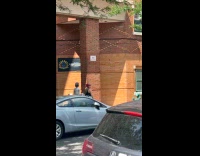 Woman wears silver dress and body paint