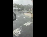 Women inside vehicle reacts to the weather