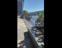 Woman sit railings flood water stairs pictorial