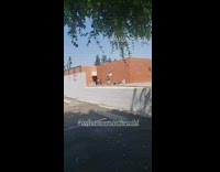 Woman grey leggings tiktok dance face mask sidewalk