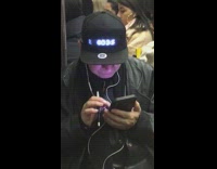 Guy wears hat that says God or gods dont exist on subway train