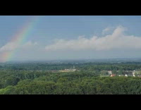 Rainbow arc seen in the sky with a wow reaction
