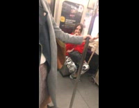 woman in white cutting her cane on train