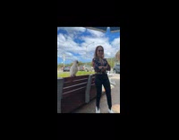 Cockatoo bird bite arm of woman 